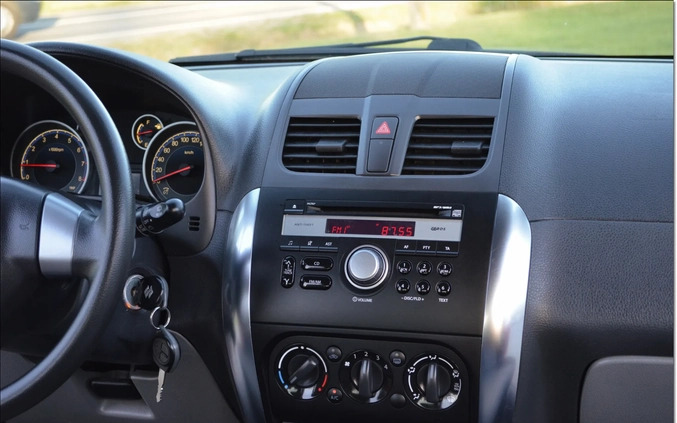 Suzuki SX4 cena 31900 przebieg: 93865, rok produkcji 2013 z Piastów małe 562